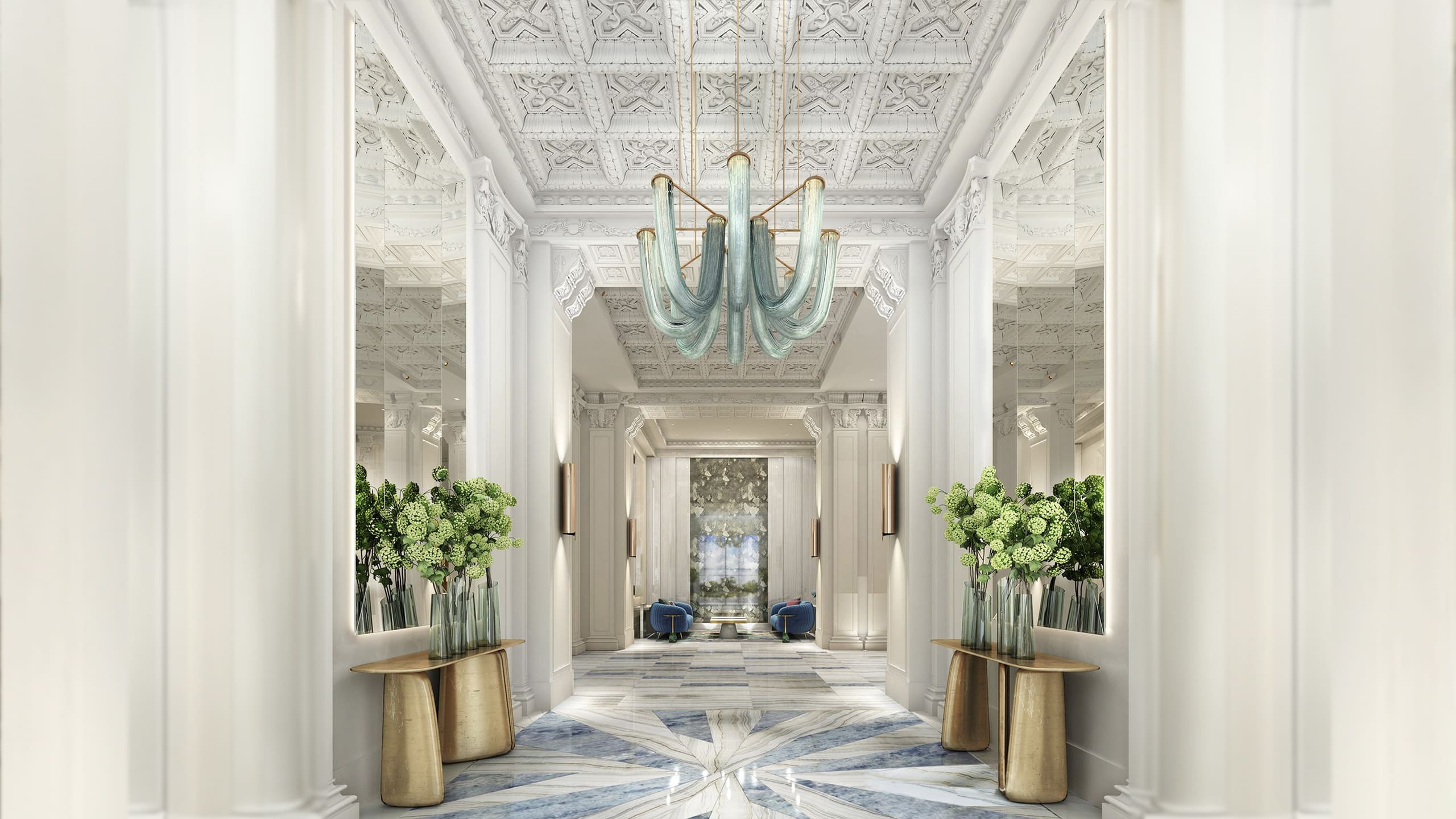 A sleek, white lobby entrance at Fairmont Breakers in Long Beach, CA.