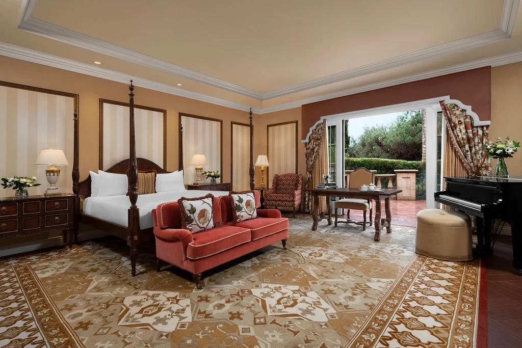 The Signature Villa at Fairmont Grand Del Mar with king bed, piano, terrace, and work desk.