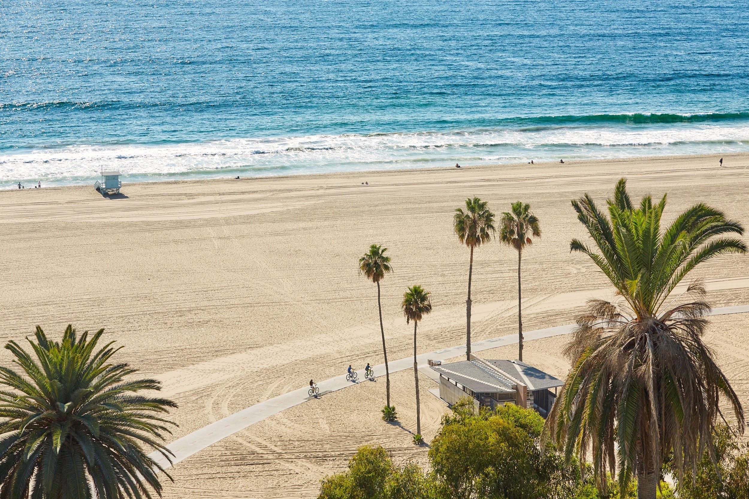 A white sand beach on a sunny day.