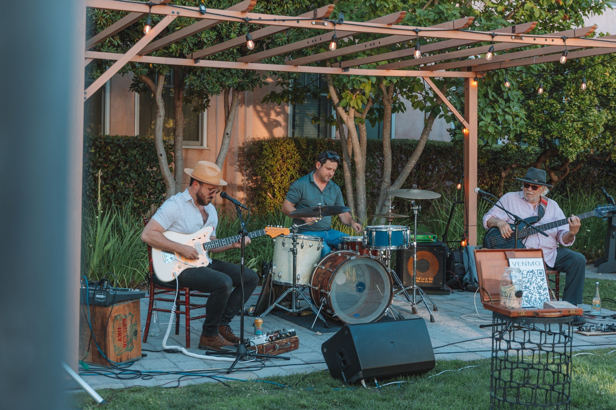 A live outdoor concert in a garden